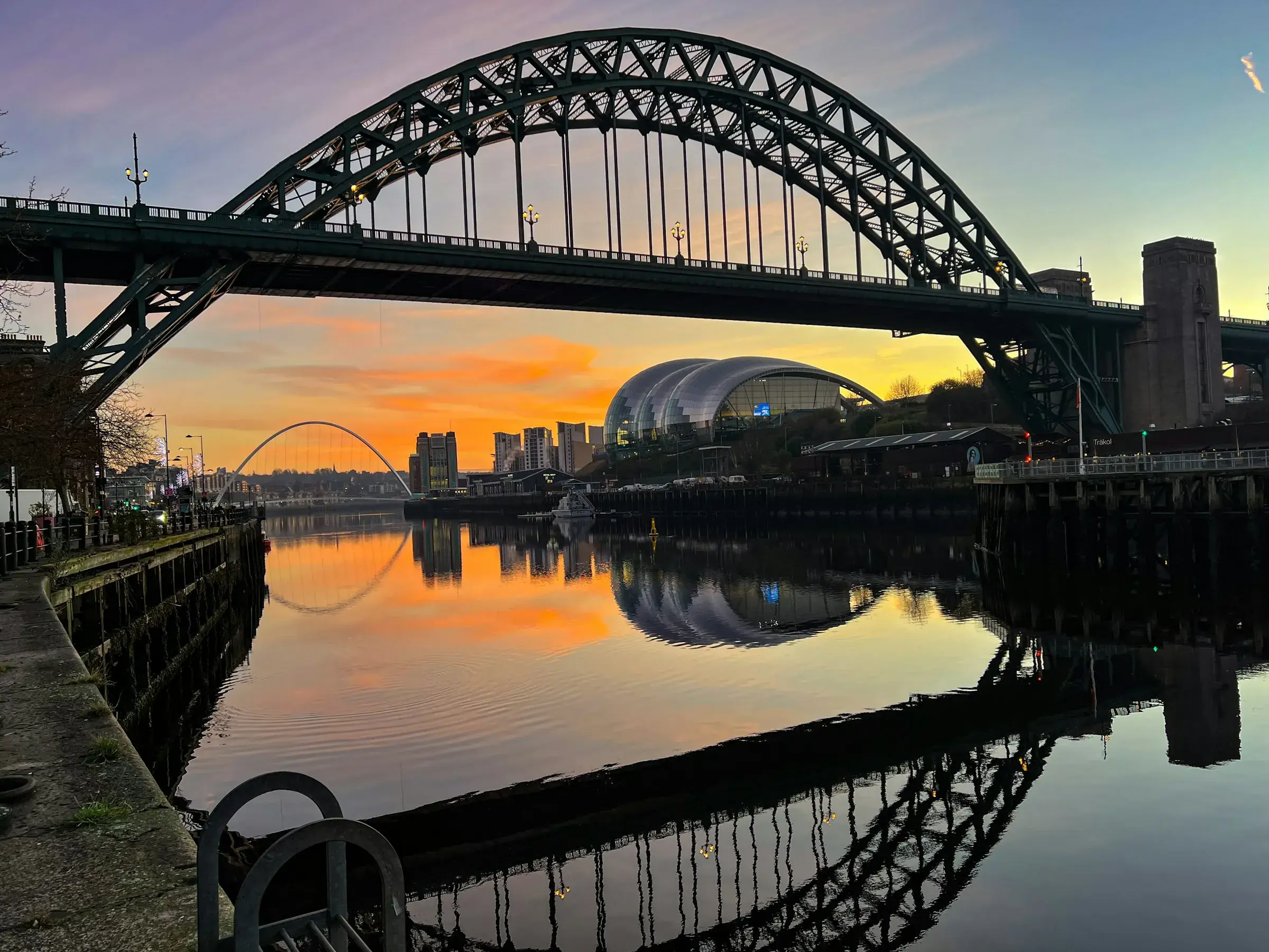 The Tyne Bridge over the Newcastle Quayside at sunset